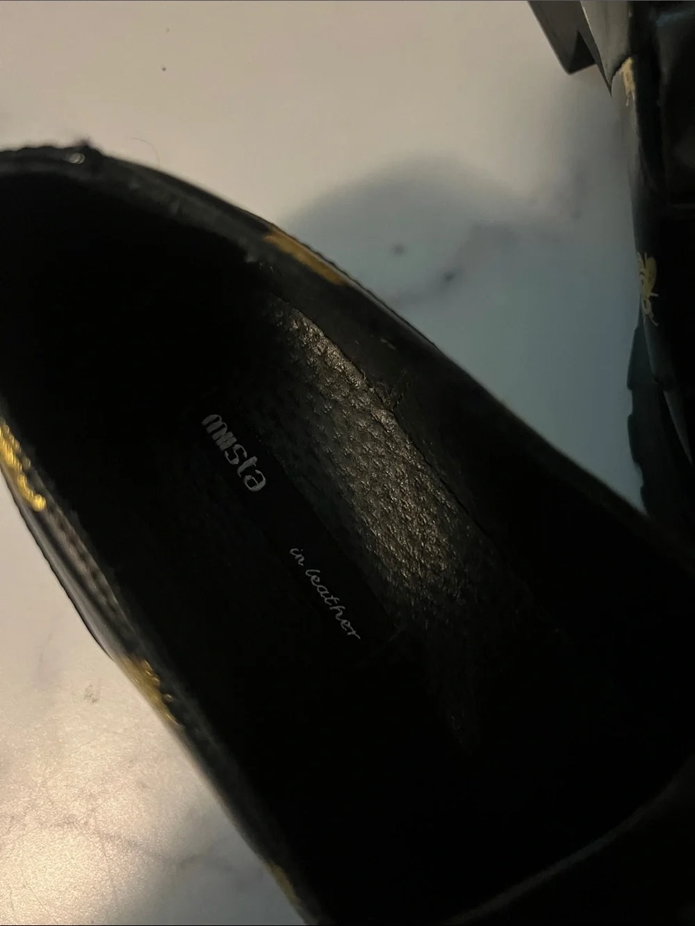 Miista Black Leather Bee-Print Kiltie Loafers